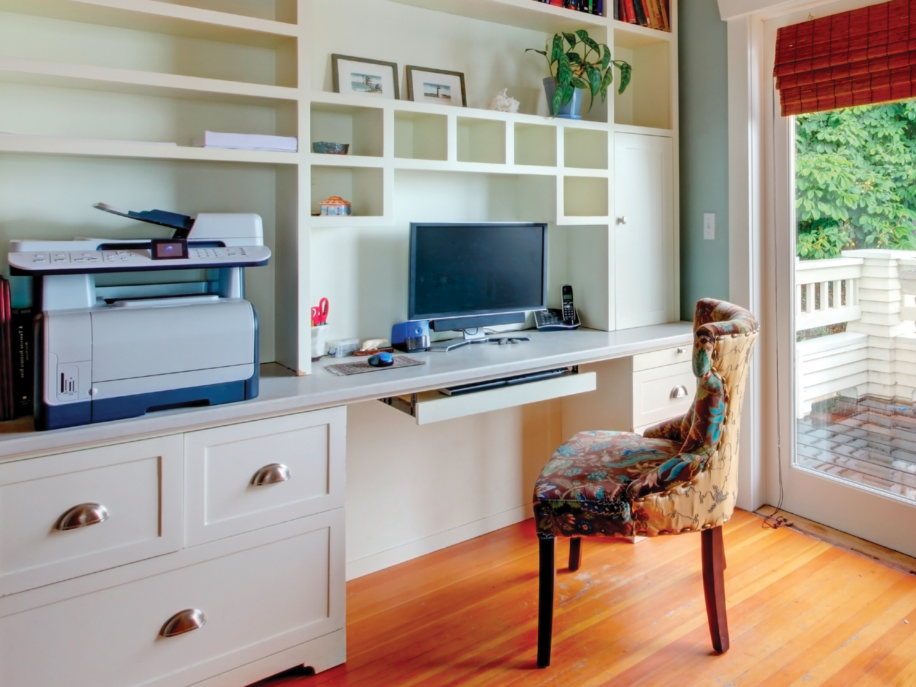 Home office workstation using compact networking equipment in a clean, space-conscious setup.
