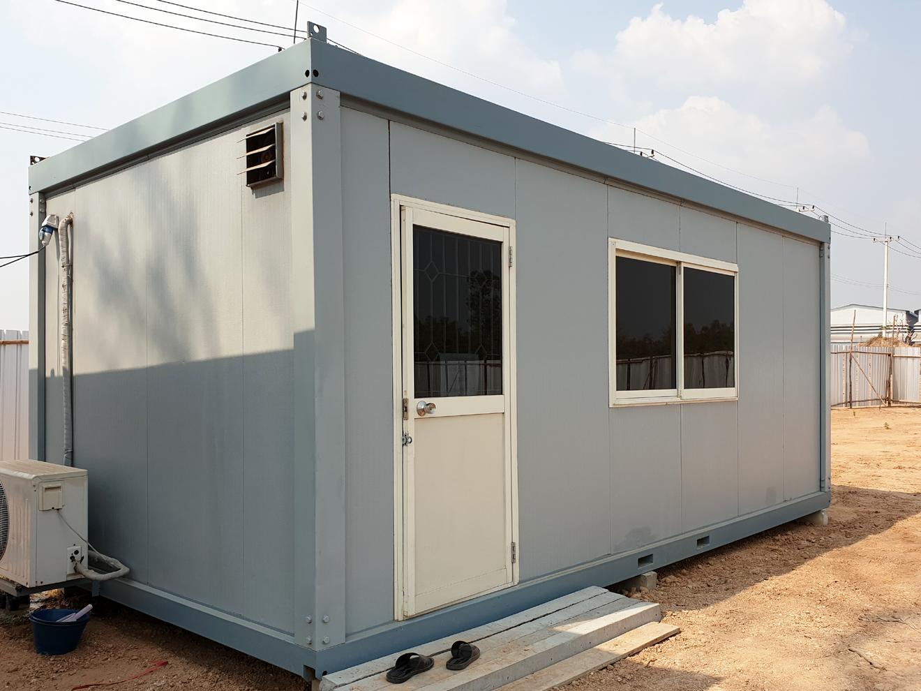 Temporary job site office with improved cellular signal for reliable internet connectivity in remote construction environments.