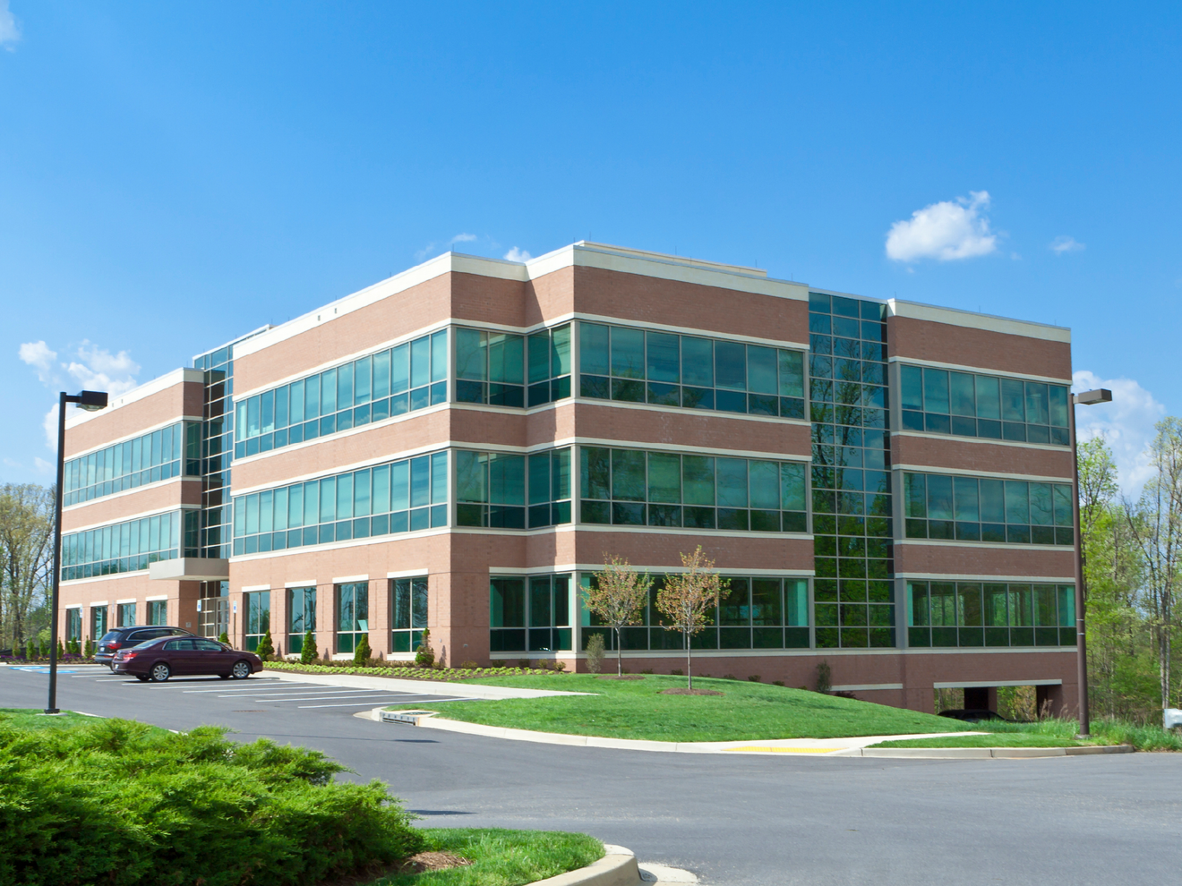 Commercial office building protected by Hawk outdoor security cameras for property monitoring.