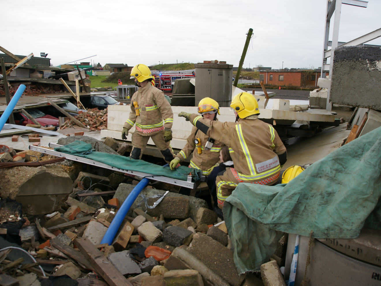 Emergency response team at a disaster site using reliable cellular connectivity during recovery efforts